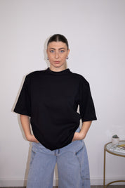 Weißes Oversize-T-Shirt mit Schulterpolstern